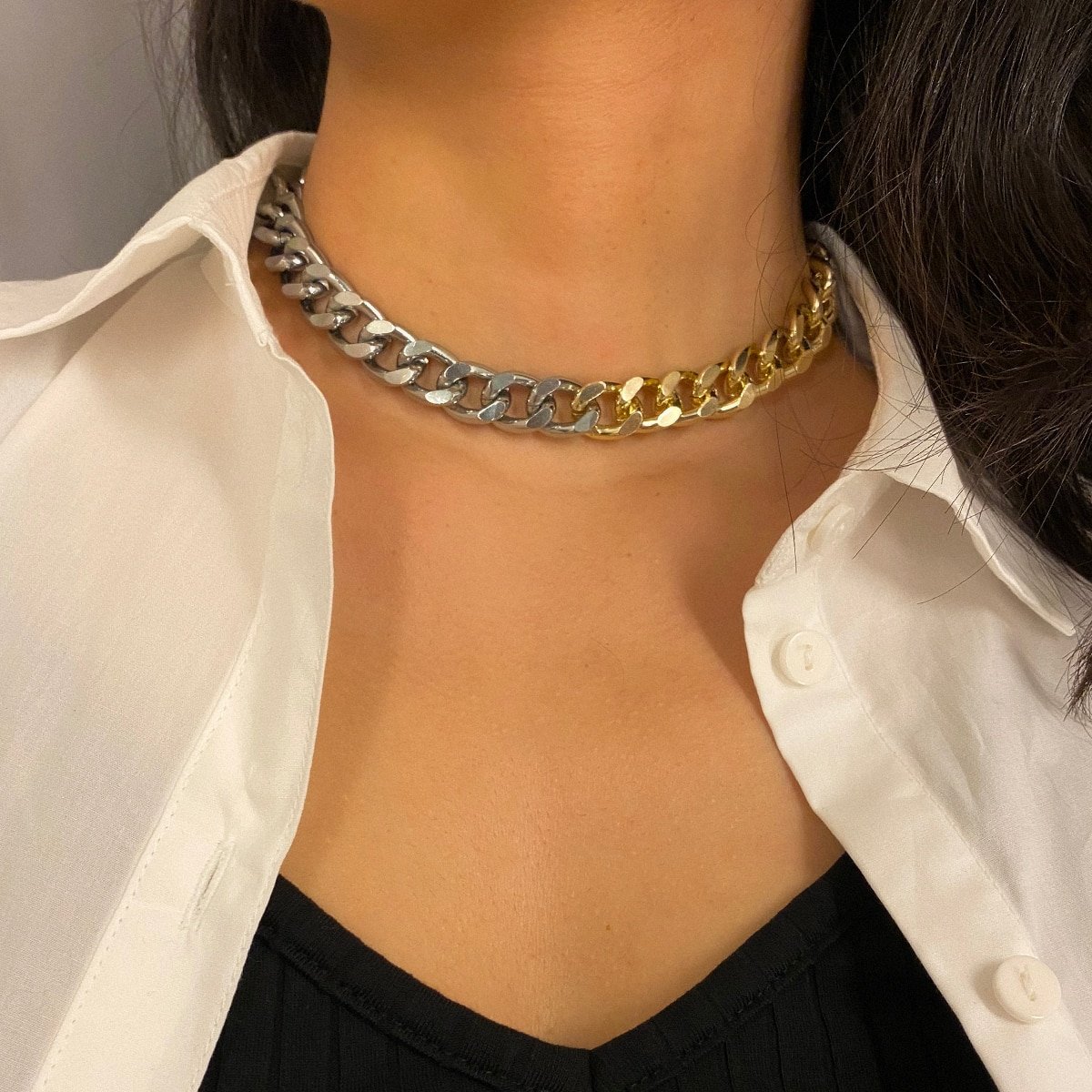 A woman wearing a Stylish Women's Thick Gold Chain Necklace.
