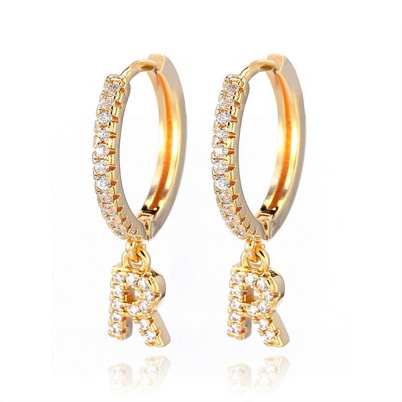 These gold plated Women's Initial Letter Hoop Earrings feature diamonds, perfect for women.