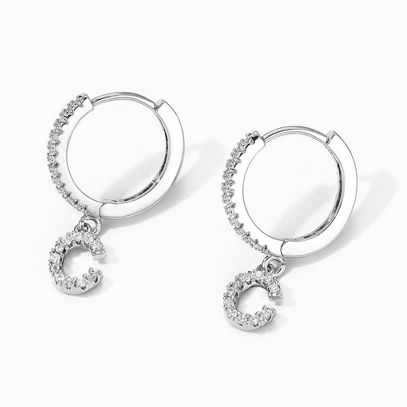 A pair of Women's Initial Letter Hoop Earrings with diamonds for women.