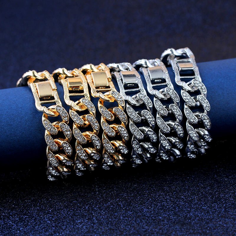 Women's Solid Link Chain Bracelet with gemstone embellishments, epitomizing new fashion trends, displayed on a blue surface.