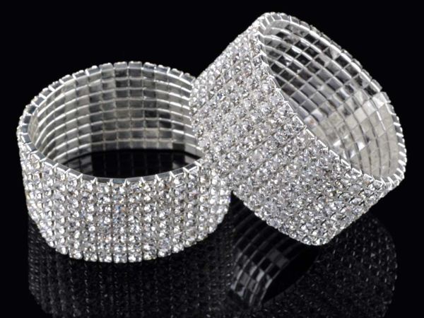 Two Full Rhinestone Elastic Bracelets on a reflective surface embody the latest women fashion trend.