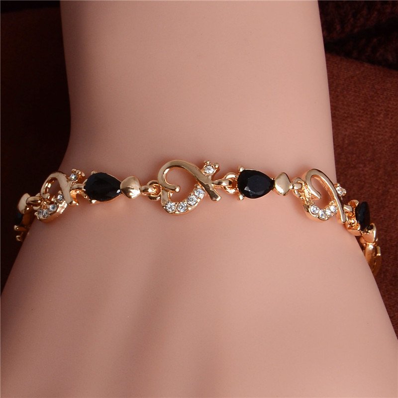 Women's Fashion Colorful Bracelets with black gemstones and crystal accents embodying new fashion trends displayed on a mannequin wrist.