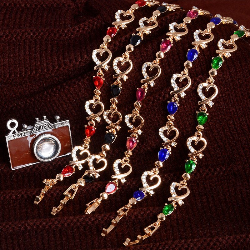 Women's Fashion Colorful Bracelets with gold-tone, gemstone accents, and charm details.